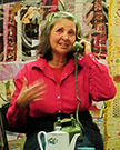 image of a smiling woman talking on a phone